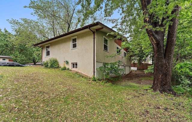 239 Buron Ln S, Saint Paul, MN 55075 - view of home's exterior featuring stucco siding