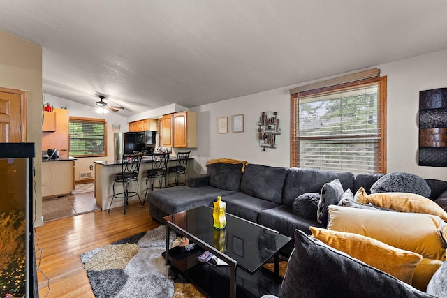239 Buron Ln S, Saint Paul, MN 55075 - living room with ceiling fan and light wood finished floors