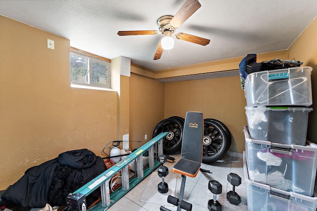 239 Buron Ln S, Saint Paul, MN 55075 - exercise room with a ceiling fan, tile patterned flooring, and a textured ceiling