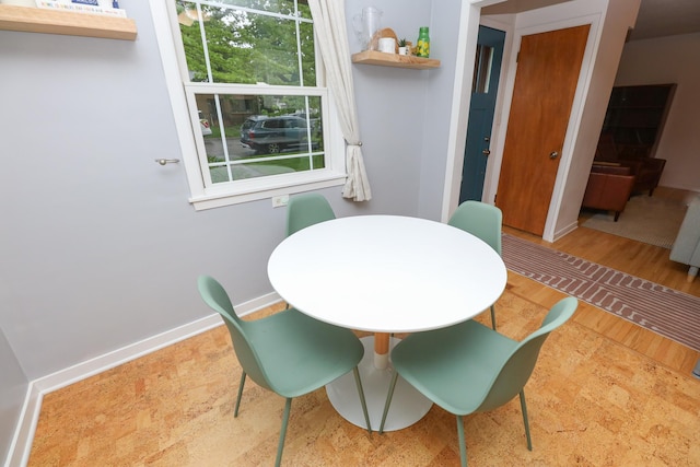 1423 Cedar St, Alexandria, MN 56308 - dining space with wood finished floors and baseboards