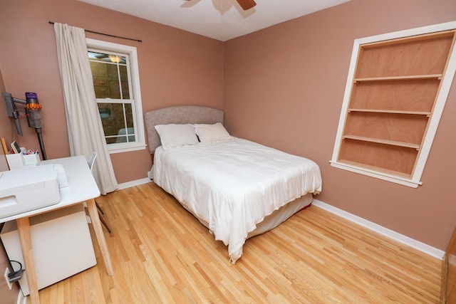 1423 Cedar St, Alexandria, MN 56308 - bedroom featuring light wood-type flooring, baseboards, and a ceiling fan