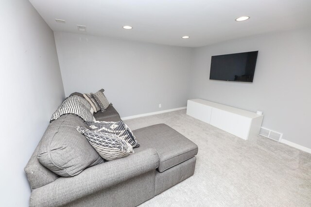 1423 Cedar St, Alexandria, MN 56308 - carpeted living area with recessed lighting and baseboards