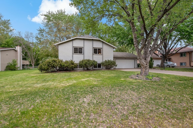 8474 Sunnyside Rd, Mounds View, MN 55112 - split level home featuring an attached garage, concrete driveway, and a front lawn
