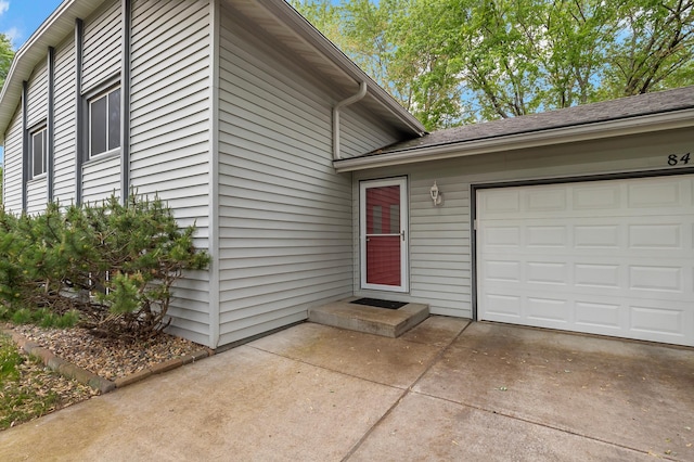 8474 Sunnyside Rd, Mounds View, MN 55112 - entrance to property with driveway and an attached garage