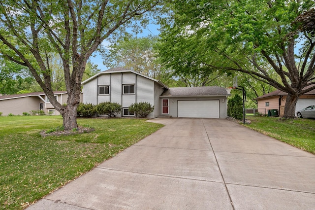 8474 Sunnyside Rd, Mounds View, MN 55112 - split level home featuring an attached garage, a front yard, and driveway