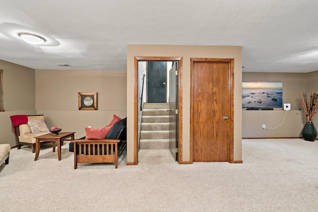 8474 Sunnyside Rd, Mounds View, MN 55112 - living area with carpet floors, stairway, baseboards, and a textured ceiling