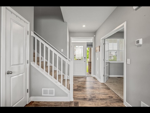 1750 Astoria Dr, Shakopee, MN 55379 - entrance foyer with stairway, wood finished floors, baseboards, and recessed lighting