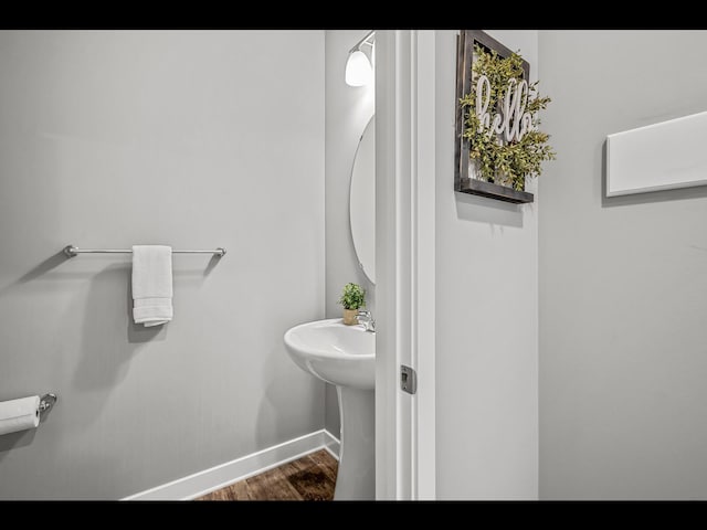 1750 Astoria Dr, Shakopee, MN 55379 - bathroom featuring wood finished floors and baseboards