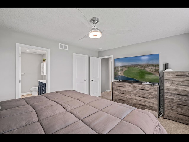 1750 Astoria Dr, Shakopee, MN 55379 - bedroom with light carpet, ensuite bath, ceiling fan, and baseboards