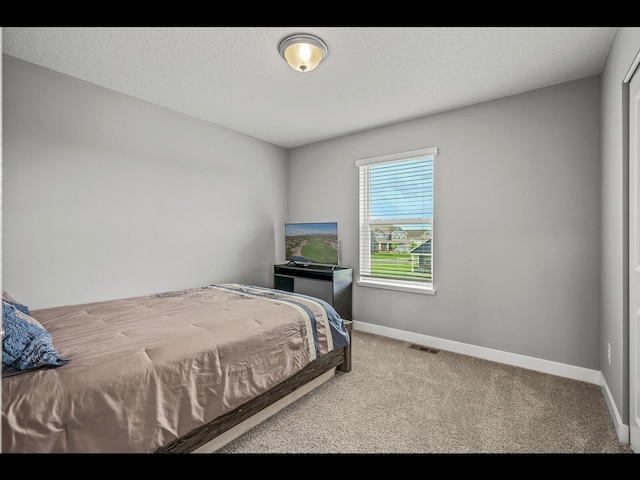 1750 Astoria Dr, Shakopee, MN 55379 - carpeted bedroom with baseboards