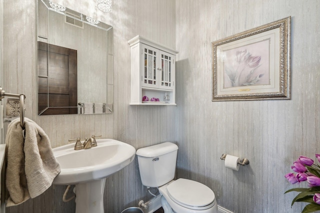 13543 Athena Way, Rosemount, MN 55068 - bathroom with toilet and wallpapered walls