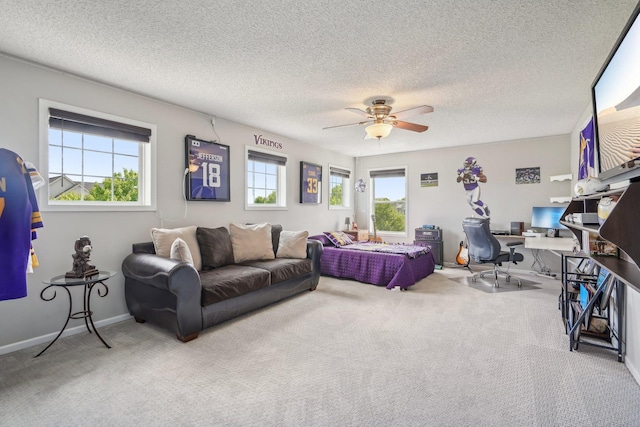 13543 Athena Way, Rosemount, MN 55068 - bedroom with carpet, an office area, baseboards, ceiling fan, and a textured ceiling