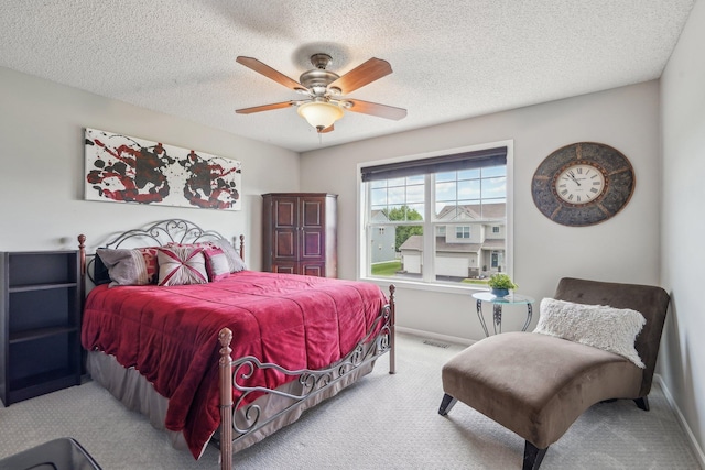 13543 Athena Way, Rosemount, MN 55068 - bedroom featuring carpet flooring, a textured ceiling, baseboards, and ceiling fan