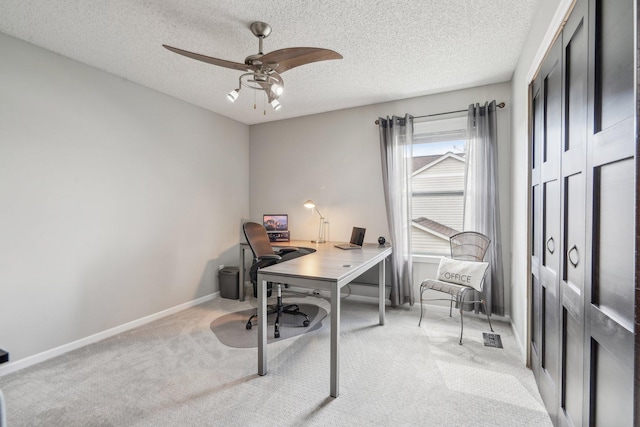 13543 Athena Way, Rosemount, MN 55068 - office area featuring light colored carpet, ceiling fan, a textured ceiling, and baseboards