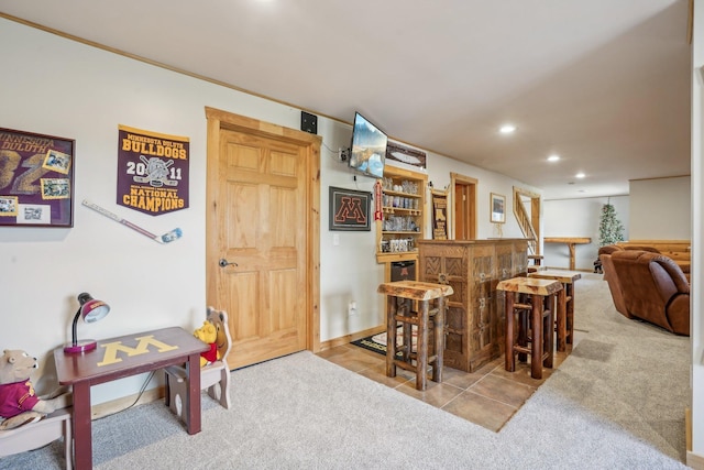 13543 Athena Way, Rosemount, MN 55068 - tiled dining space with a bar, carpet floors, recessed lighting, and baseboards
