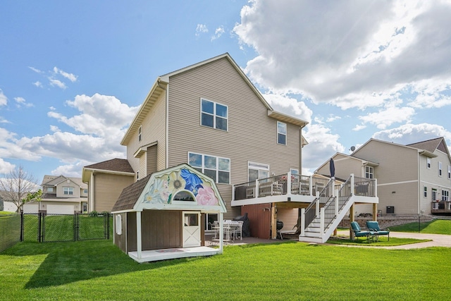 13543 Athena Way, Rosemount, MN 55068 - back of house featuring a gate, a wooden deck, stairway, a residential view, and a patio area