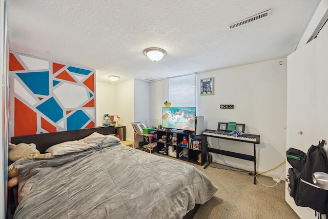 6407 Emerson Ave N, Brooklyn Center, MN 55430 - carpeted bedroom with a textured ceiling and baseboards