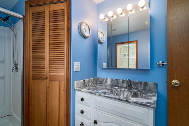 13914 Elmer Hanson Dr SE, Woodside Twp, MN 56736 - full bathroom with a closet, vanity, and a shower
