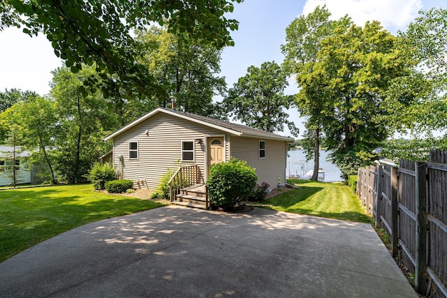 13914 Elmer Hanson Dr SE, Woodside Twp, MN 56736 - back of property featuring a patio