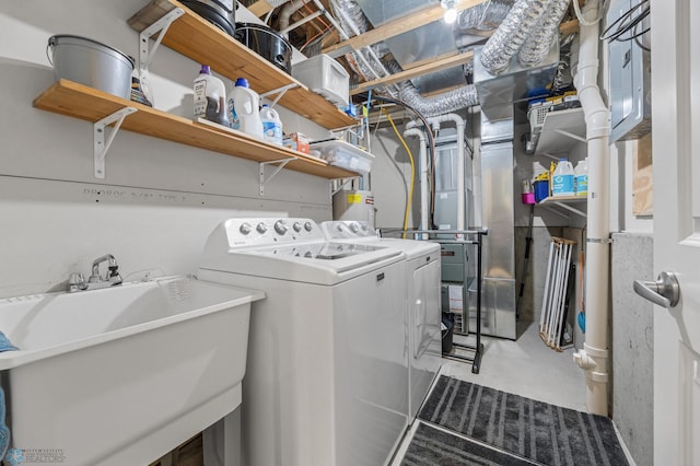 5512 Bishops Blvd S Unit D, Fargo, ND 58104 - laundry room featuring washing machine and clothes dryer