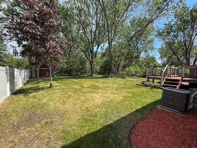 938 Selby Ave, Saint Paul Park, MN 55071 - view of yard featuring a deck and central AC unit