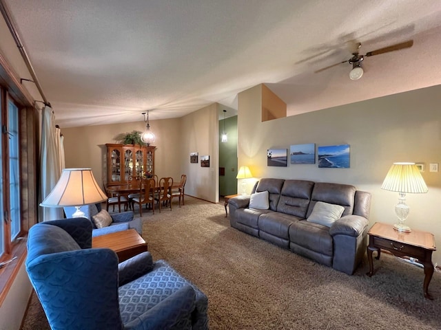 1715 Hansen Dr SW, Willmar, MN 56201 - carpeted living room featuring a ceiling fan and lofted ceiling
