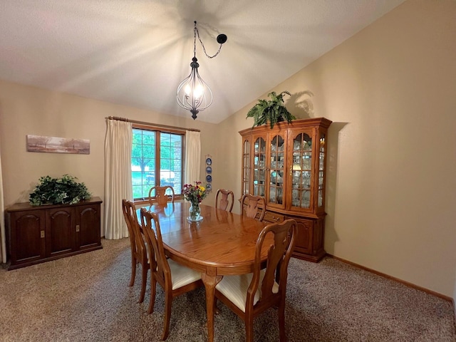 1715 Hansen Dr SW, Willmar, MN 56201 - dining area featuring light carpet, vaulted ceiling, and baseboards