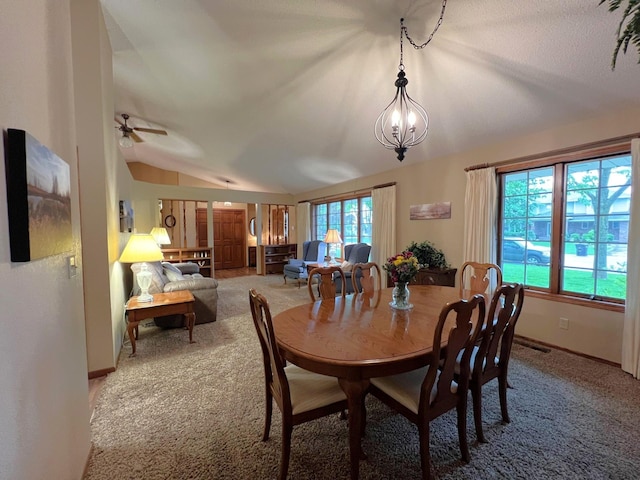 1715 Hansen Dr SW, Willmar, MN 56201 - carpeted dining room with vaulted ceiling, baseboards, a chandelier, and a ceiling fan