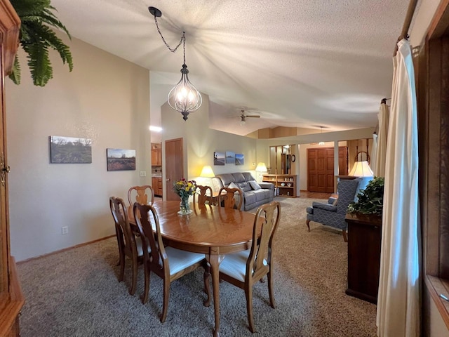 1715 Hansen Dr SW, Willmar, MN 56201 - carpeted dining room featuring vaulted ceiling, baseboards, ceiling fan, and a textured ceiling