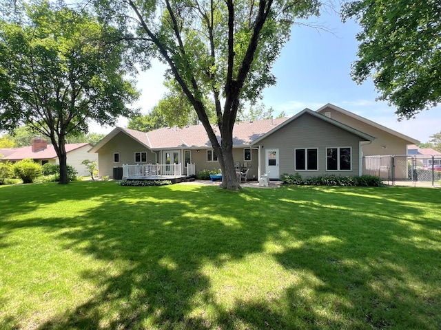1715 Hansen Dr SW, Willmar, MN 56201 - rear view of house featuring a deck