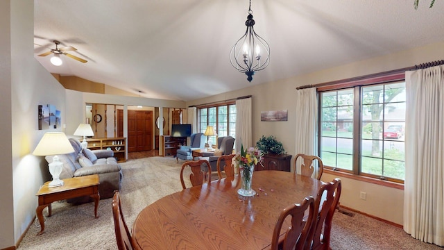 1715 Hansen Dr SW, Willmar, MN 56201 - dining area with vaulted ceiling, carpet floors, and ceiling fan