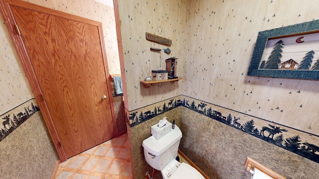 1715 Hansen Dr SW, Willmar, MN 56201 - half bath featuring toilet and wallpapered walls