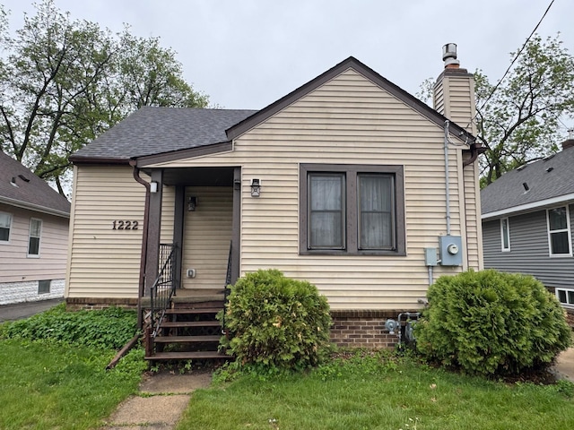 1222 2nd St NE, Rochester, MN 55906 - bungalow with a chimney and roof with shingles