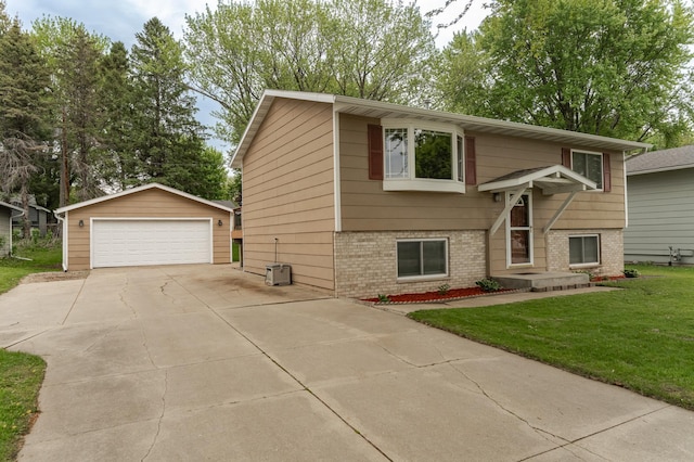 222 6th Ave NW, Byron, MN 55920 - raised ranch with brick siding, a garage, an outbuilding, and a front yard