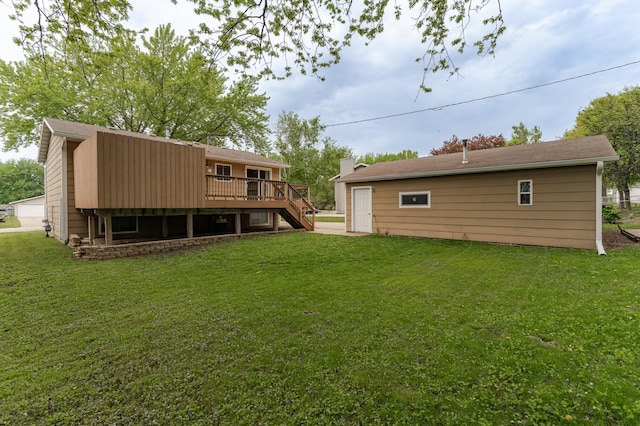 222 6th Ave NW, Byron, MN 55920 - rear view of property featuring stairway, a wooden deck, and a yard