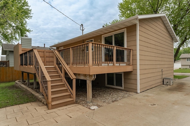 222 6th Ave NW, Byron, MN 55920 - back of house featuring a deck and stairs