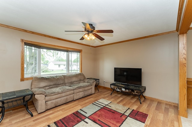 222 6th Ave NW, Byron, MN 55920 - living room with a ceiling fan, wood finished floors, crown molding, and baseboards