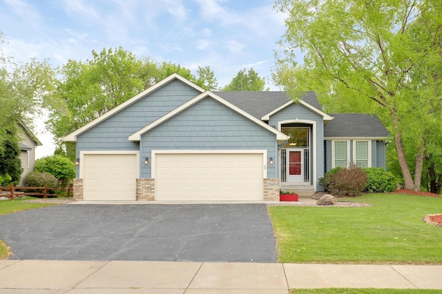 22669 128th Ave N, Rogers, MN 55374 - view of front of house featuring a garage, driveway, and a front yard