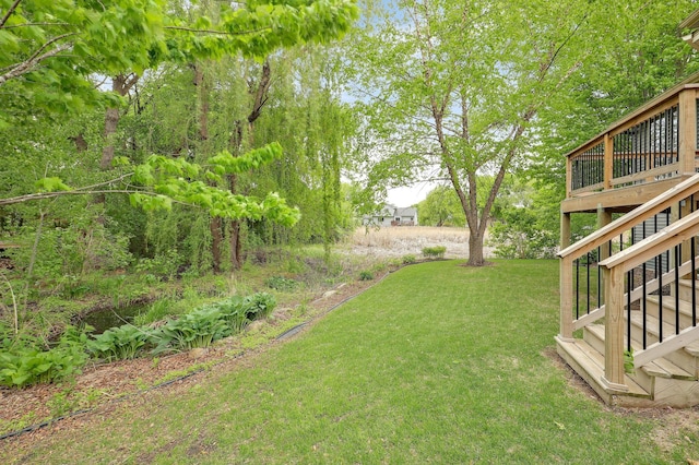 22669 128th Ave N, Rogers, MN 55374 - view of grassy yard featuring stairs and a deck