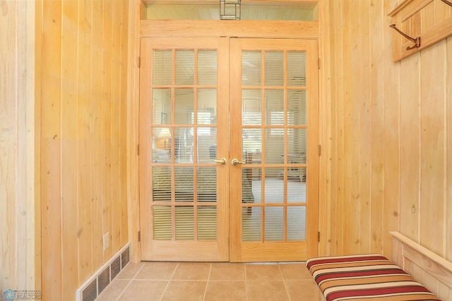 38682 Walker Lake Dr, Amor Twp, MN 56576 - entryway featuring wood walls and tile patterned flooring