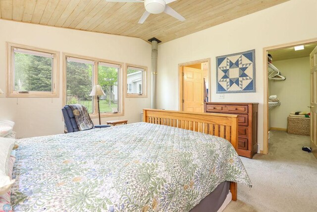 38682 Walker Lake Dr, Amor Twp, MN 56576 - bedroom with carpet, vaulted ceiling, wooden ceiling, a spacious closet, and ceiling fan