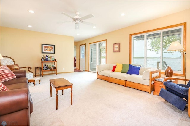 38682 Walker Lake Dr, Amor Twp, MN 56576 - living area with light colored carpet, ceiling fan, recessed lighting, and baseboards