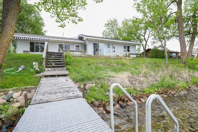 38682 Walker Lake Dr, Amor Twp, MN 56576 - back of property featuring stairs and a wooden deck