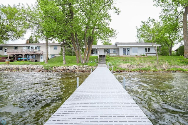 38682 Walker Lake Dr, Amor Twp, MN 56576 - dock area with a yard and a deck with water view