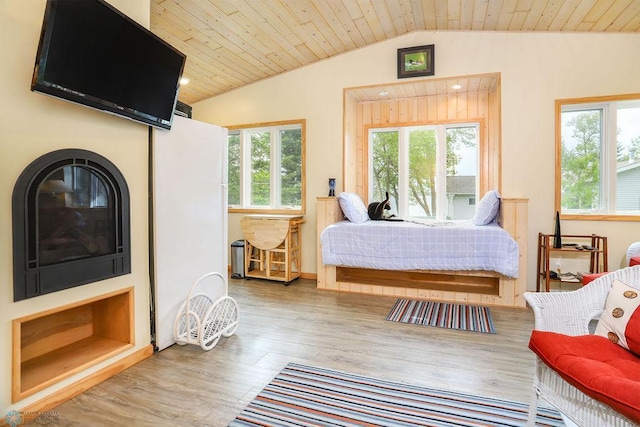 38682 Walker Lake Dr, Amor Twp, MN 56576 - bedroom with lofted ceiling, wood finished floors, and wood ceiling