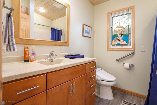 38682 Walker Lake Dr, Amor Twp, MN 56576 - bathroom with vanity, wood finished floors, toilet, wood ceiling, and baseboards