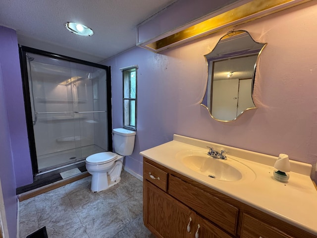57230 351st St, Grove City, MN 56243 - full bath with a shower stall, toilet, vanity, baseboards, and a textured ceiling
