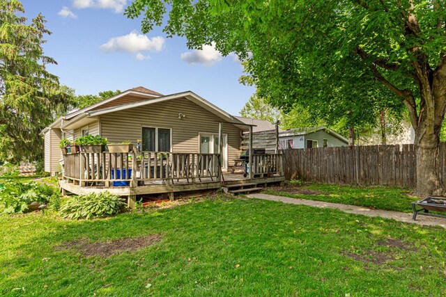 410 Spruce Ave NW, Montgomery, MN 56069 - back of property featuring a wooden deck