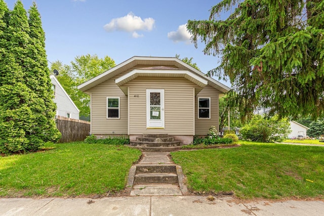 410 Spruce Ave NW, Montgomery, MN 56069 - bungalow featuring entry steps