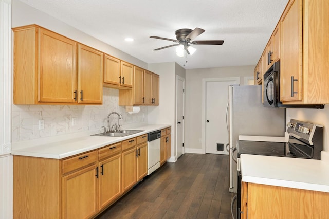 8783 Hastings Cir NE, Blaine, MN 55449 - kitchen with electric stove, a sink, white dishwasher, black microwave, and ceiling fan